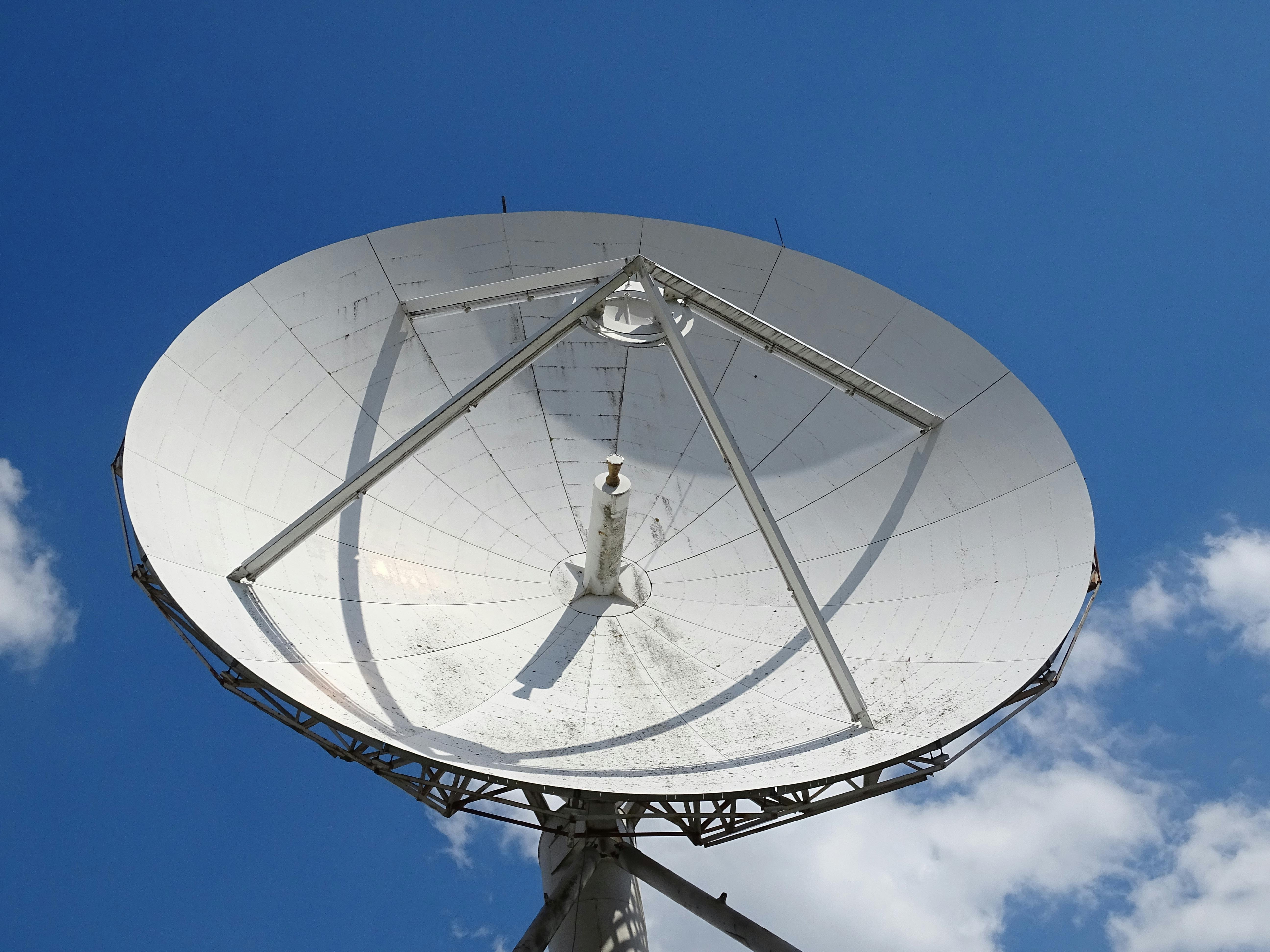 Satellite ground station array at dusk